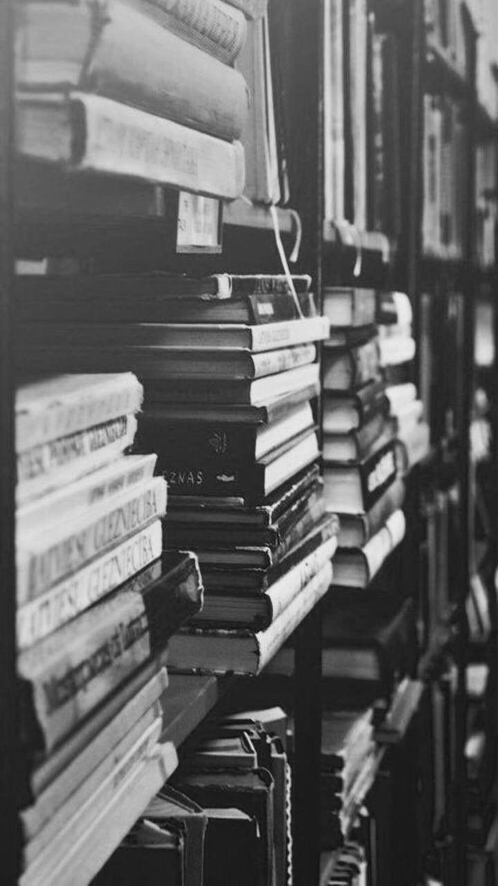 Ladies in black and white in a library
